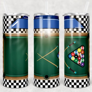May include: A stainless steel tumbler with a checkered pattern and a pool table design. The design features a green felt pool table with brown wooden rails, two crossed pool cues, and a rack of billiard balls.
