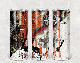 May include: A stainless steel tumbler with a white and orange design featuring a trout, a deer, and an arrow. The design is reminiscent of a camouflage pattern.