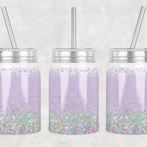 May include: Three silver mason jars with lids and straws. The jars are filled with a light purple glitter and a layer of iridescent glitter at the bottom.