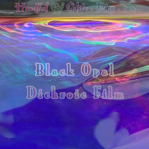 Holographic, iridescent foil set, pictured  in various angles, showing iridescence, sheen  and colour for Black Opal mylar. Individual sheet or set of 3.