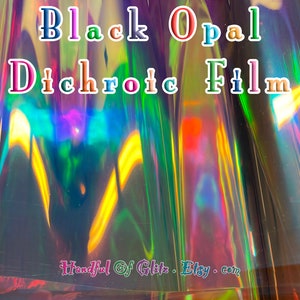 Bundle of iridescent foil set, pictured  in various angles, showing iridescence, sheen  and colour for Black Opal mylar. Set of 10.