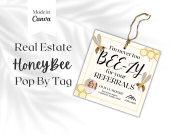 May include: A real estate Honey Bee Pop By Tag with the text "I'm never too BEE-ZY for your REFERRALS". The tag features bee illustrations and a photo of Olivia Moore, a real estate agent.