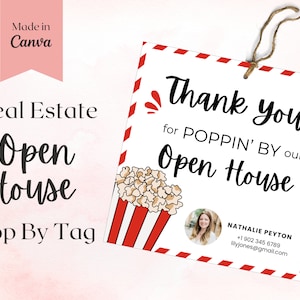 Op de afbeelding: Een wit en rood open huis bord met een popcorn emmer illustratie en de tekst "Thank you for POPPIN' BY our Open House". Het bord bevat ook contactgegevens voor Nathalie Peyton.