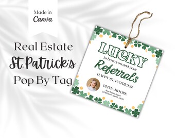 May include: A green and gold St. Patrick's Day themed real estate pop by tag with shamrocks and the text "Lucky to have you and your referrals. Happy St. Patrick's!"  Olivia Moore, Real Estate Agent, COMPANY NAME HERE.