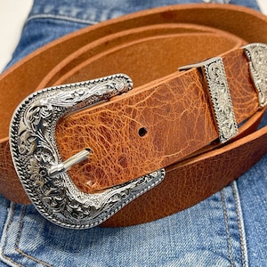 Western Leather Belt 1 1/2" | Tapered Ranger Belt | Cowboy Rodeo Mens leather belt | Genuine Leather Belt for men and women Custom leather belt
High Quality belt
cowboy belt
Water Buffalo Belt
Premium Leather Belt
Genuine Leather Belt
Brown Leather
