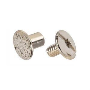 May include: Two silver-colored metal screws. One screw has a flat, round head with a floral design. The other screw has a slotted head and a threaded shaft. Both screws are on a white background.