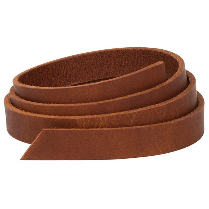 May include: A roll of brown leather strap, approximately 1 inch wide, for crafting projects.