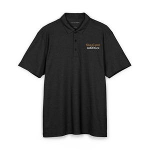 May include: A charcoal gray short-sleeve polo shirt featuring a collar, a three-button placket, and the text SkyCast Additive embroidered in orange and white on the left chest area. The shirt has a heathered texture and a standard fit design.