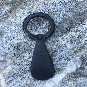 Hand forged bottle opener