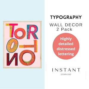 May include: Two printable wall art prints with the word "Toronto" in a distressed, colorful, layered font style. The prints are framed in a light wood frame and have a pink background. The text "Typography Wall Decor 2 Pack" is displayed above the image. The text "Highly detailed distressed lettering" is displayed in a circle below the image. The text "Instant Download" is displayed below the circle.