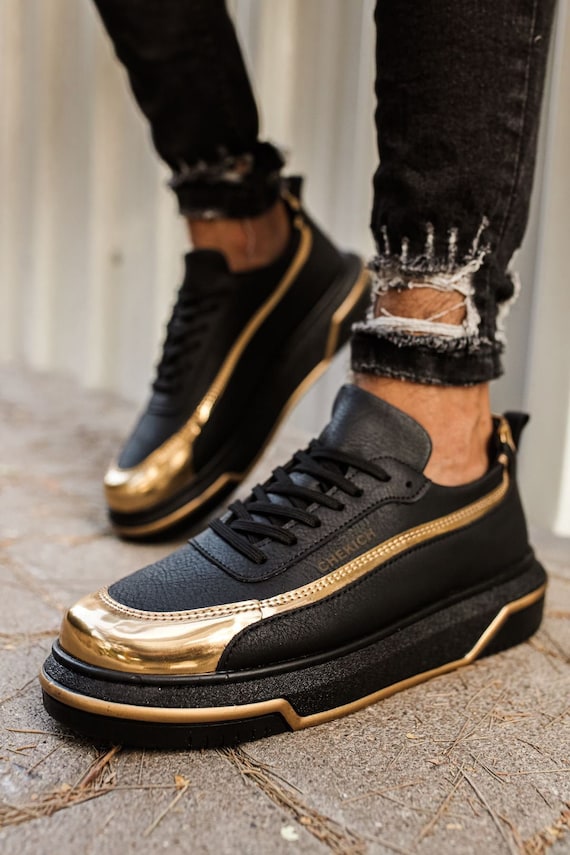 black and gold sneakers