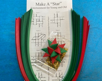 Make a Star Kit - 100 Strips - Red and Green. Includes sample star, instructions and glitter pack. Makes 25 stars.