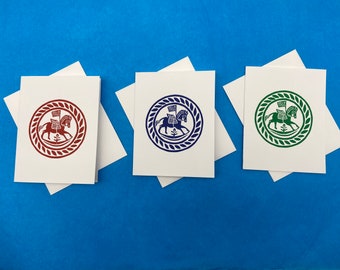 Cartons de correspondance - Motif cheval à bascule - Papier blanc - Intérieur vierge. (8) cartes avec enveloppes.