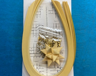 Make a Star Kit - 100 Strips - Parchment. Includes sample star, instructions and glitter pack. Makes 25 stars.