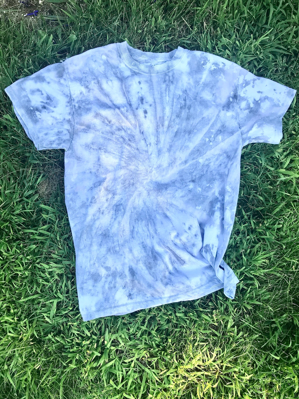 black tie dye on grey shirt