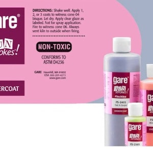 May include: Three bottles of Gare Fun Strokes non-toxic underglaze. The bottles are labeled with the product name, color, and number. The bottles are on a pink background with the Gare Fun Strokes logo and directions for use.