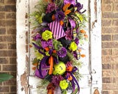 Halloween candy wreath swag, Halloween porch decor, large Halloween swag, trick or treat wreath swag, purple green orange, for your door