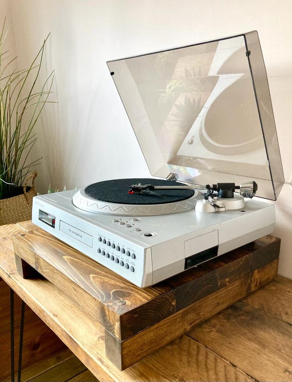 My apartment is incredibly small, but I'm finally happy with my turntable  setup. Everything is better with LED lights, right? : r/vinyl