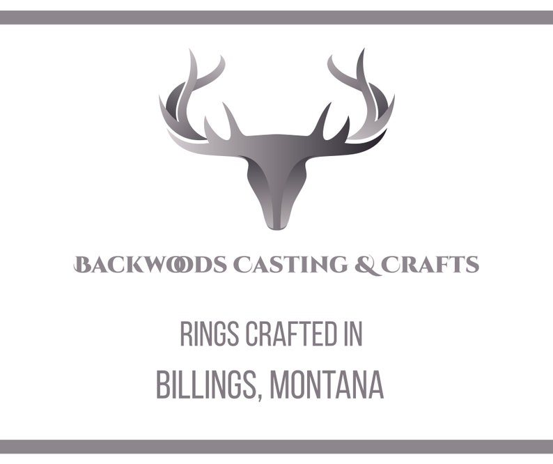 May include: A silver deer head logo with antlers against a white background. The text "Backwoods Casting & Crafts" is below the logo. The text "Rings Crafted in Billings, Montana" is below the text.