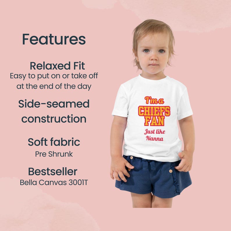 May include: White t-shirt with red and orange text that reads "I'ma CHIEFS FAN Just like Nanna". A young child is wearing the shirt and blue denim shorts.