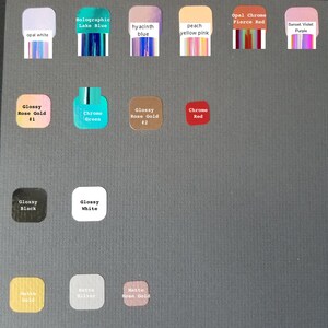 May include: A chart of nail polish colours with names like "Holographic Lake Blue", "Opal Chrome Fierce Red", and "Glossy Rose Gold #1".
