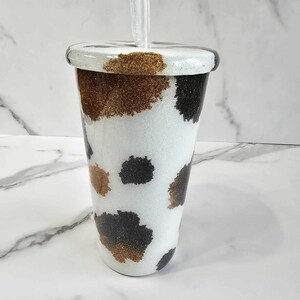 Cow print glitter tumbler