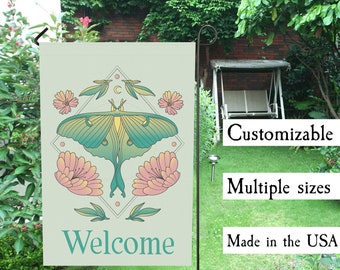May include: A green and blue moth with pink flowers and leaves on a light green background. The text "Welcome" is at the bottom of the image.