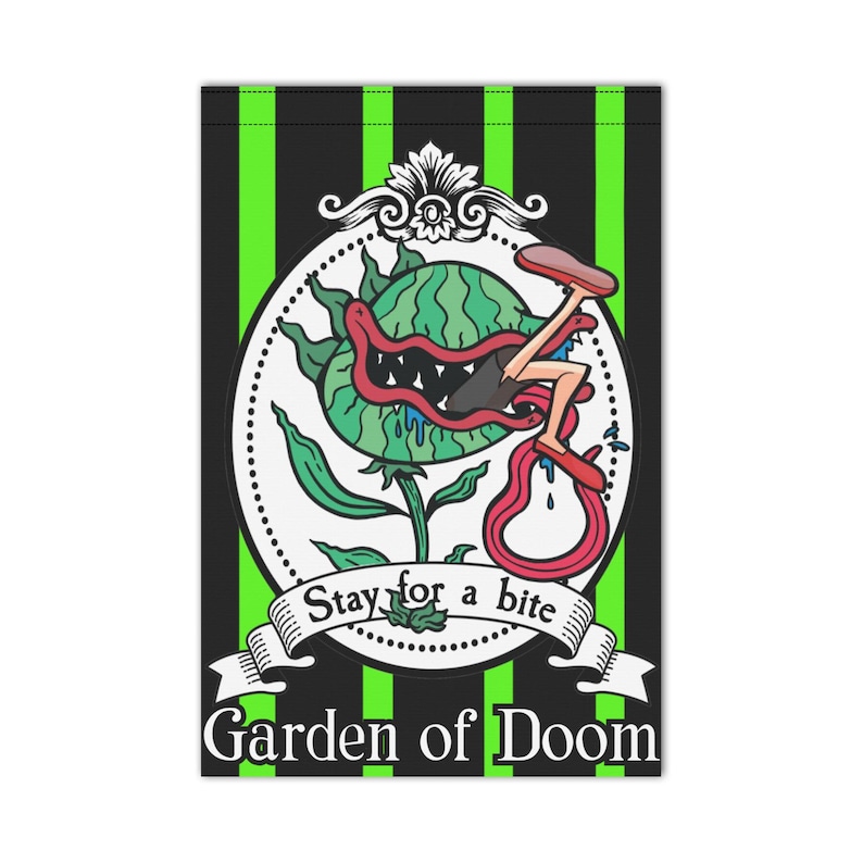 May include: A decorative garden flag featuring a cartoon illustration of a carnivorous plant with a person's legs and feet. The flag has the text "Stay for a bite" and "Garden of Doom" on a black and green striped background.
