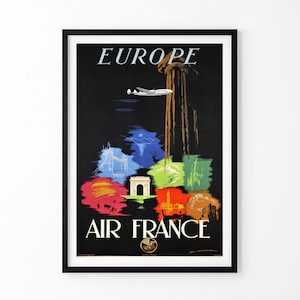 May include: A framed vintage travel poster titled EUROPE AIR FRANCE featuring a black background with a white airplane flying near a tall brown column. Below, colorful abstract shapes display various European landmarks and silhouettes.