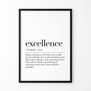 May include: A framed wall art print featuring the word excellence in a black serif font, followed by its phonetic pronunciation and the definition: always striving to do better, not a skill but an attitude, the result of risking more.