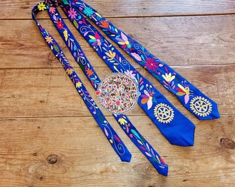 Otomi embroidered ties in collaboration with Rotary international