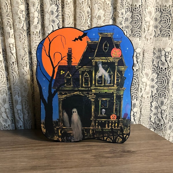 Retro Halloween Decoration Haunted House with Spectres and Orange Moon
