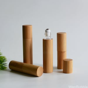 1-200 piezas 5 ml 10 ml botella de rodillo de aceite esencial de madera de bambú natural, botella de aceite para el cuidado de los labios, botella de rollo de piel de perfume portátil, venta al por mayor
