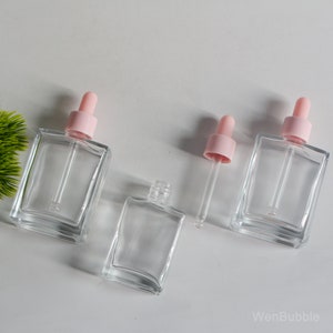 1-100 pezzi 1oz 30ml 50ml 100ml flaconi contagocce quadrati in vetro per oli essenziali, flacone contagocce rosa, flacone pipetta per olio per siero cosmetico per la pelle