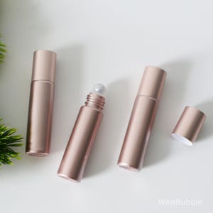 1-200 botellas de vidrio de oro rosa macizo de 10 ml con forma de rollo para aceites esenciales, botellas portátiles con forma de rollo para perfumes y bálsamos labiales, venta al por mayor