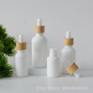 1-200pcs 10ml 15ml 20ml 30ml 50ml 100ml White Porcelain Glass Serum Essential Oil Dropper Bottle, Natural Bamboo Wooden Pipette Oil Bottle