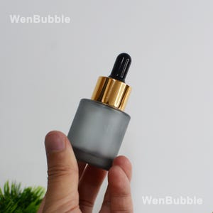 1-200px 20ml Flat Shoulder Gold Matte Black Transparent Glass Serum Essential Oil Dropper Bottle, Men Facial Skin Care Oil Bottle, Wholesale
