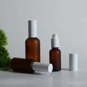 1-200 pezzi 15 ml 30 ml 50 ml 100 ml 1 oz bottiglia di pompa per trattamento di siero per lozione in vetro opaco ambrato, bottiglia con ugello di erogazione per la cura della pelle di bellezza, commercio all'ingrosso