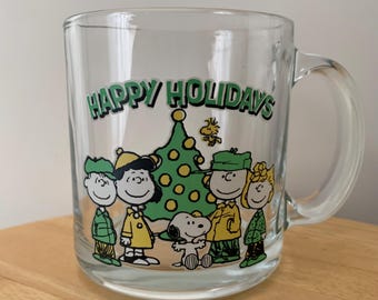 Charlie Brown Snoopy Linus Sally Lucy and Woodstock The Peanuts Happy Holiday Coffee Mug