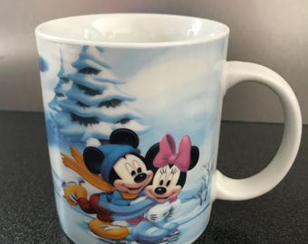 Walt Disney Minnie Mouse, Mickey Mouse, Pluto, Goofy Winter Time Fun Coffee Mug 12 oz