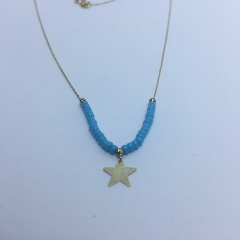 Handmade 18k gold star Necklace With Turquoise Stone.