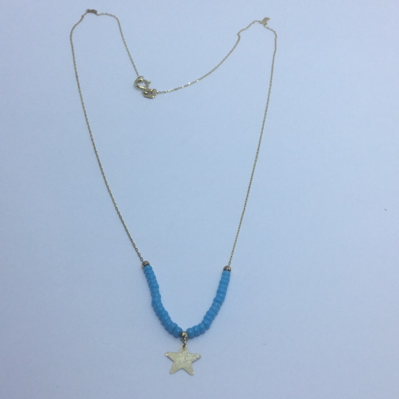 Handmade 18k gold star Necklace With Turquoise Stone.