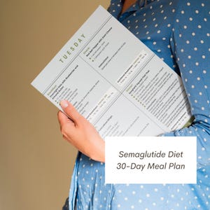 May include: A close-up of a printed sheet of paper with a 30-day meal plan titled "Semaglutide Diet 30-Day Meal Plan". The meal plan includes a list of foods for each day of the week, including breakfast, snack, nutrition break, and dinner.