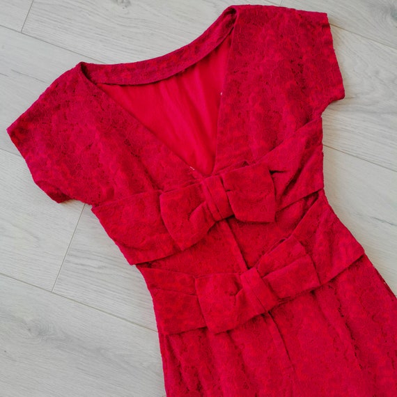 1950s red lace wiggle dress with bows in the back