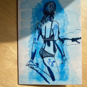 Tattoed strand babe.