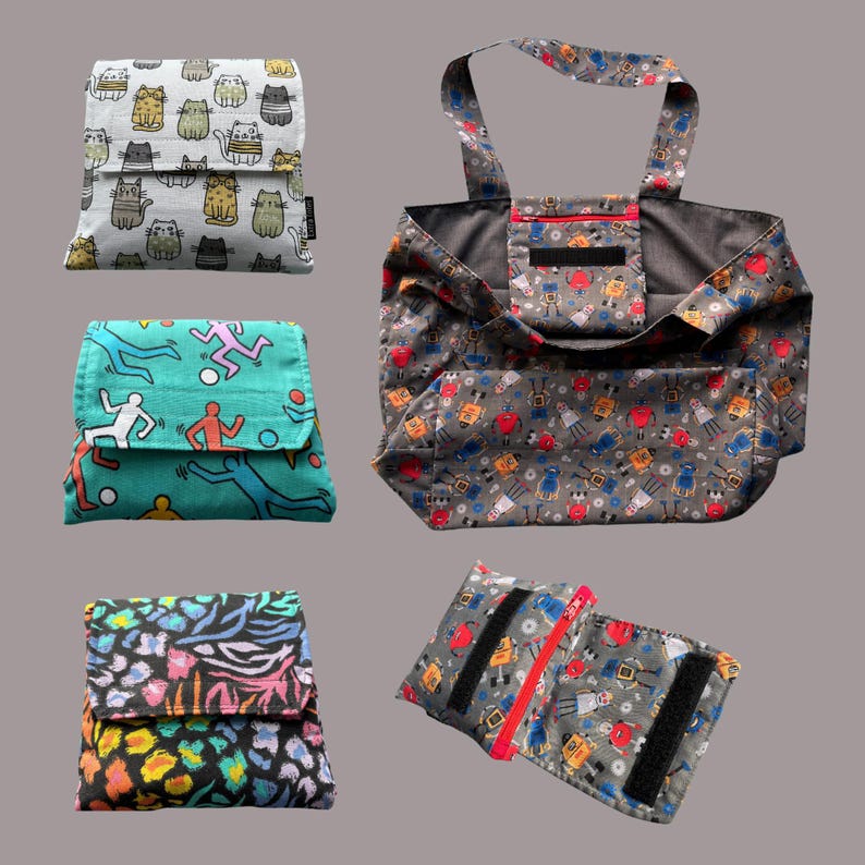 May include: Four reusable shopping bags, each with a different pattern. The first bag has a white background with a repeating pattern of cats. The second bag has a teal background with a repeating pattern of stick figures playing soccer. The third bag has a black background with a repeating pattern of colorful abstract shapes. The fourth bag has a gray background with a repeating pattern of robots.