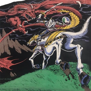 May include: An illustration of a knight on a white horse battling a red dragon. The knight is clad in silver armor and wields a sword. The dragon has large wings and sharp claws. The background is dark with a green grassy area.