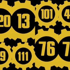 May include: A set of nine gold gears with black centers, each featuring a different number printed in yellow: 420, 13, 101, 43, 69, 111, 76, and 77.