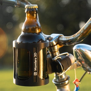 Free drinking system in matt black, 3D printed bottle holder for the front handlebars in beer design