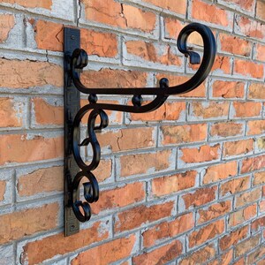 Metallpflanzenaufhängerhaken, Metallhaken für Blumen, Haken für Laternen, Eisenhängehakenhalterung, Halterung für ein Schild, Gartenhaken.